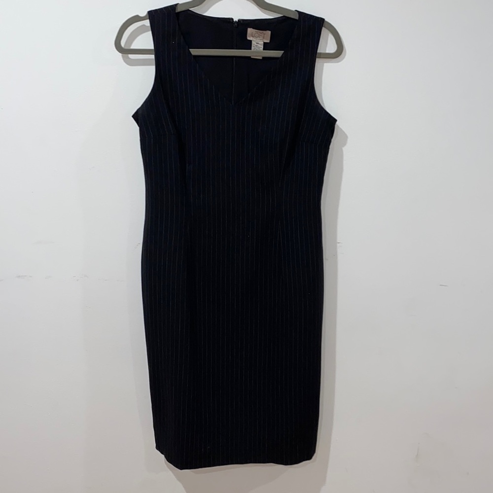 Black dress with very small white line stripes.